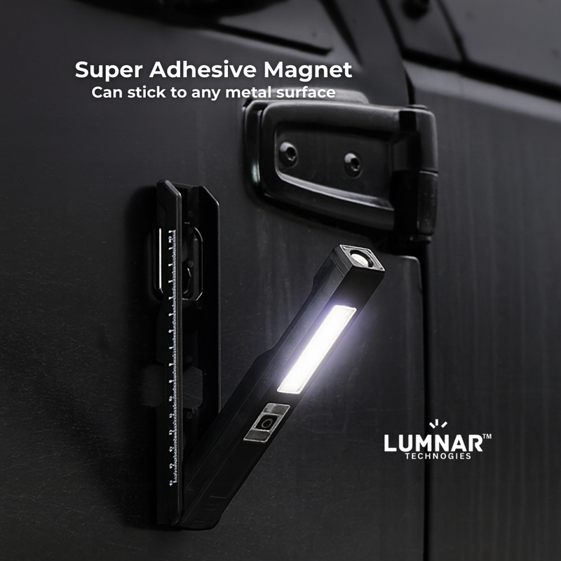 Black magnetic light attached to a vehicle door with text about super adhesive magnet and Lumnar Technologies branding.